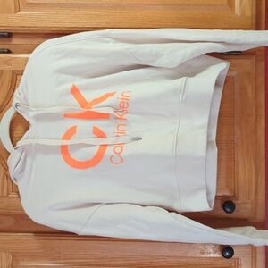 Calvin Klein Women's Cropped Beige Hoodie with Bright Orange Logo